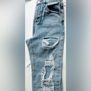 SUPER DISTRESSED Women’s Faded Denim Jeans, approximately 26” Rise10” Inseam 23”